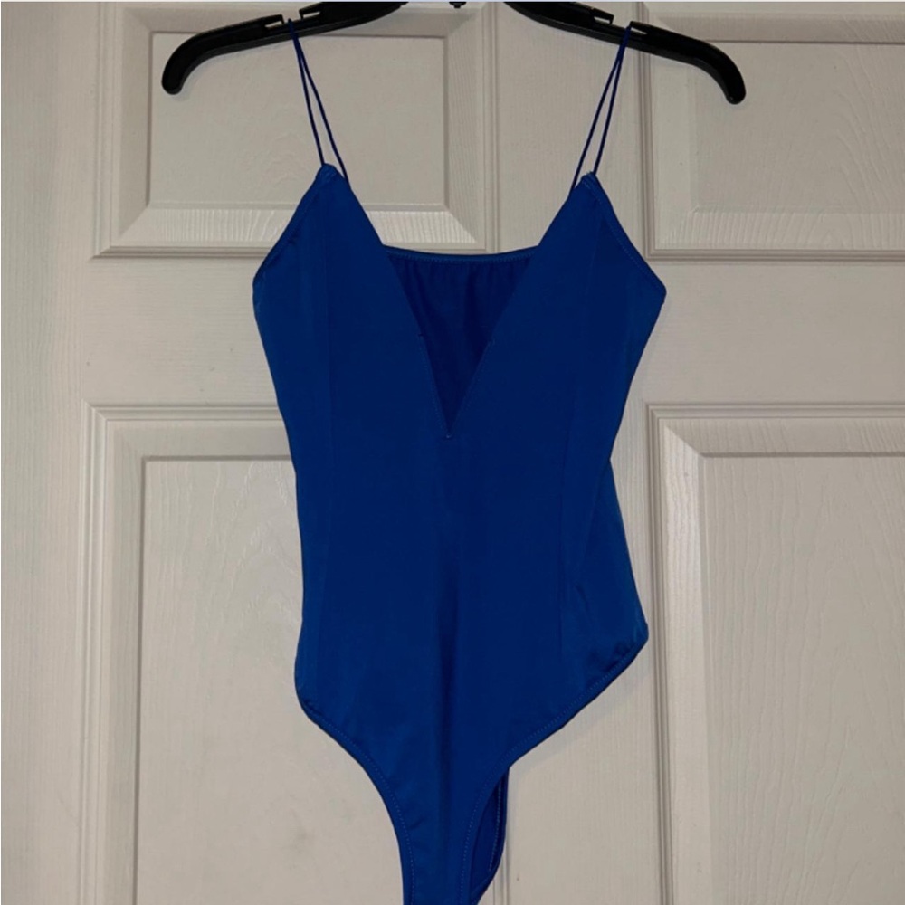 Blue body suit with V cut neckline- small
